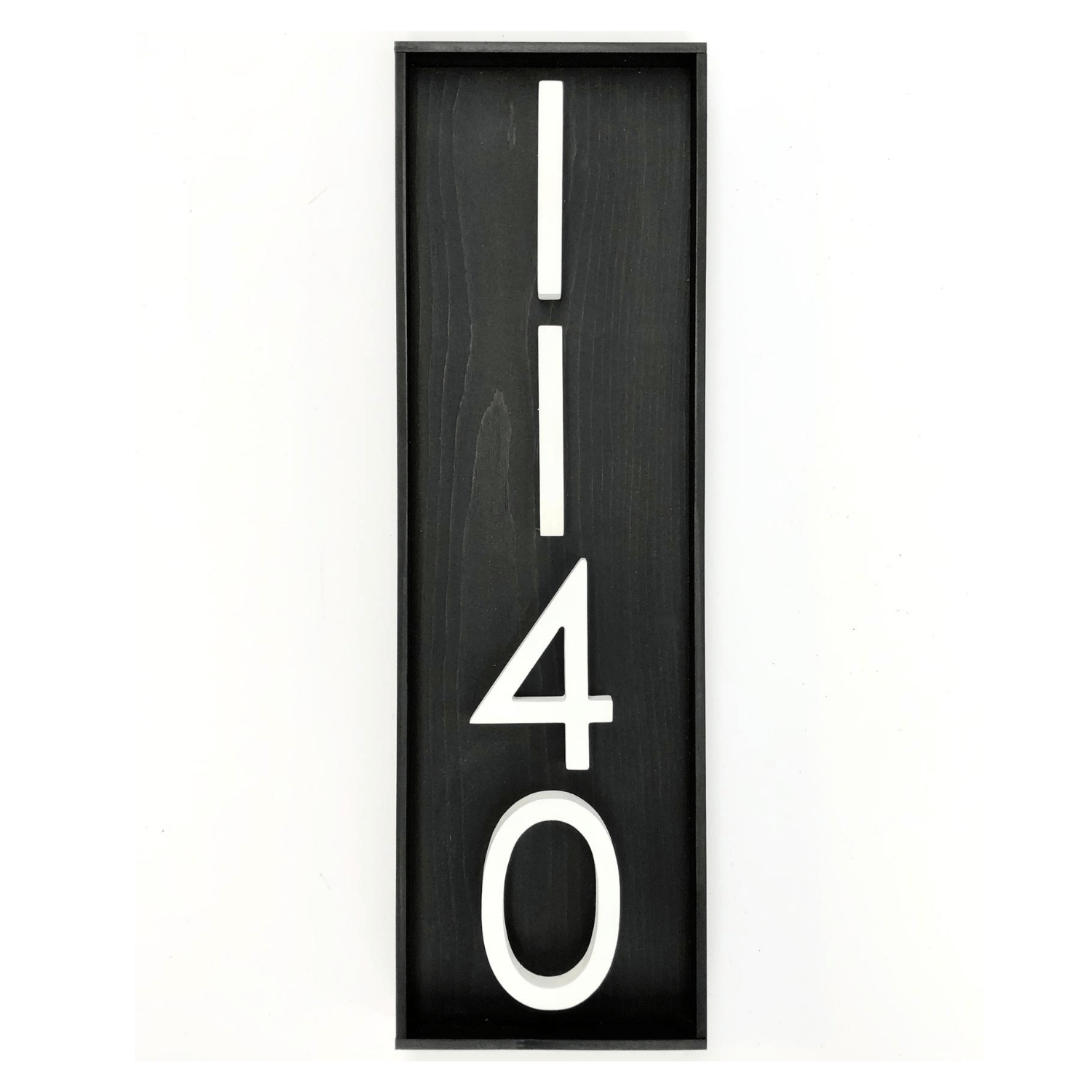 Vertical address sign with black base and 1 modern white PVC numbers